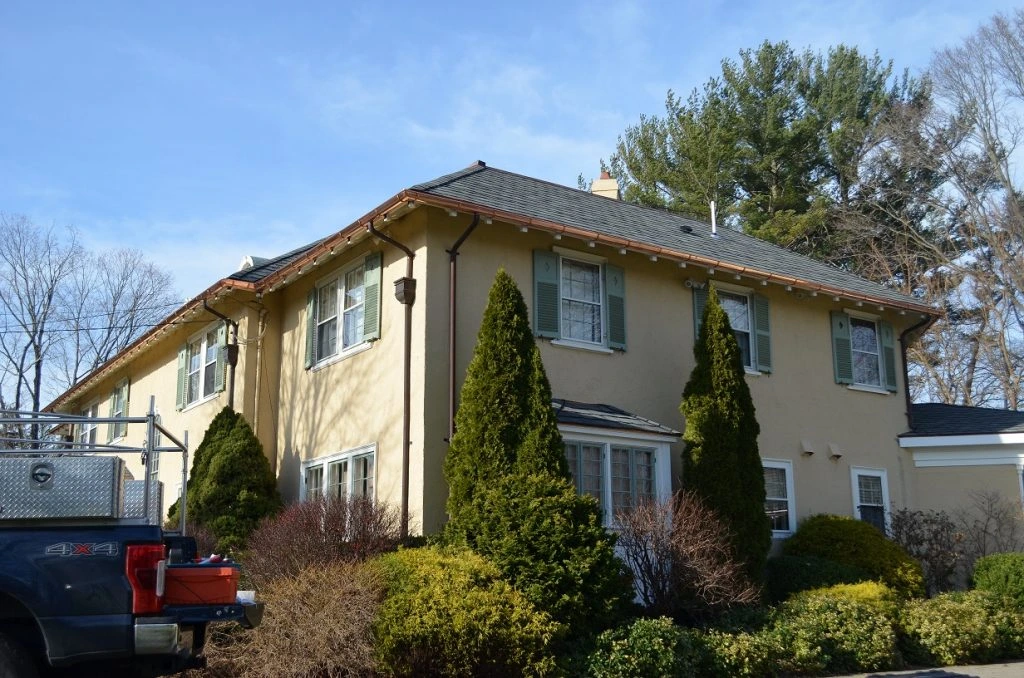 home with copper gutters