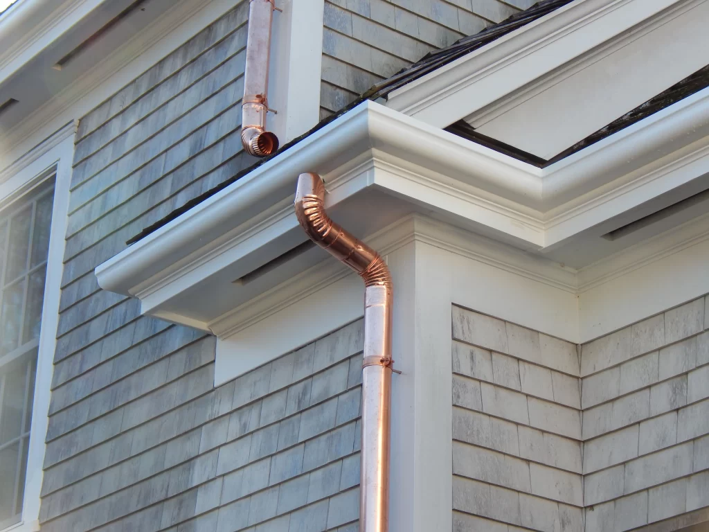 copper downspouts and Fiberglass Gutters